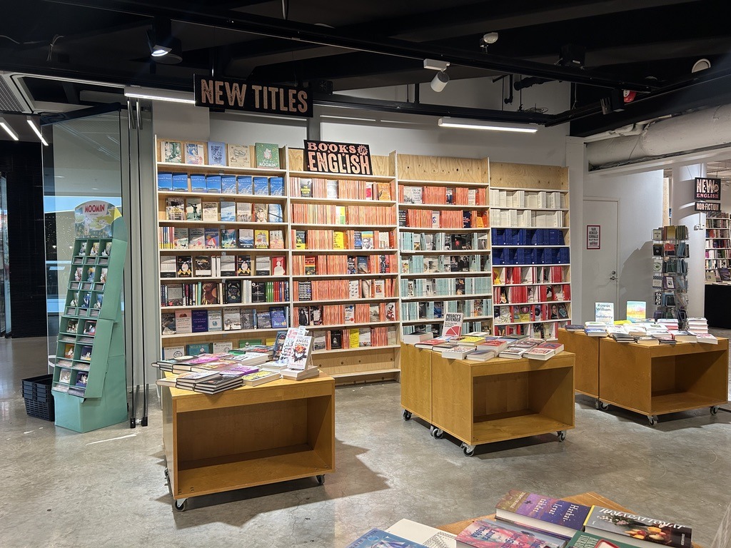 A towering shelf stacked with Penguin books inside Rosebud Sivullinen in Helsinki