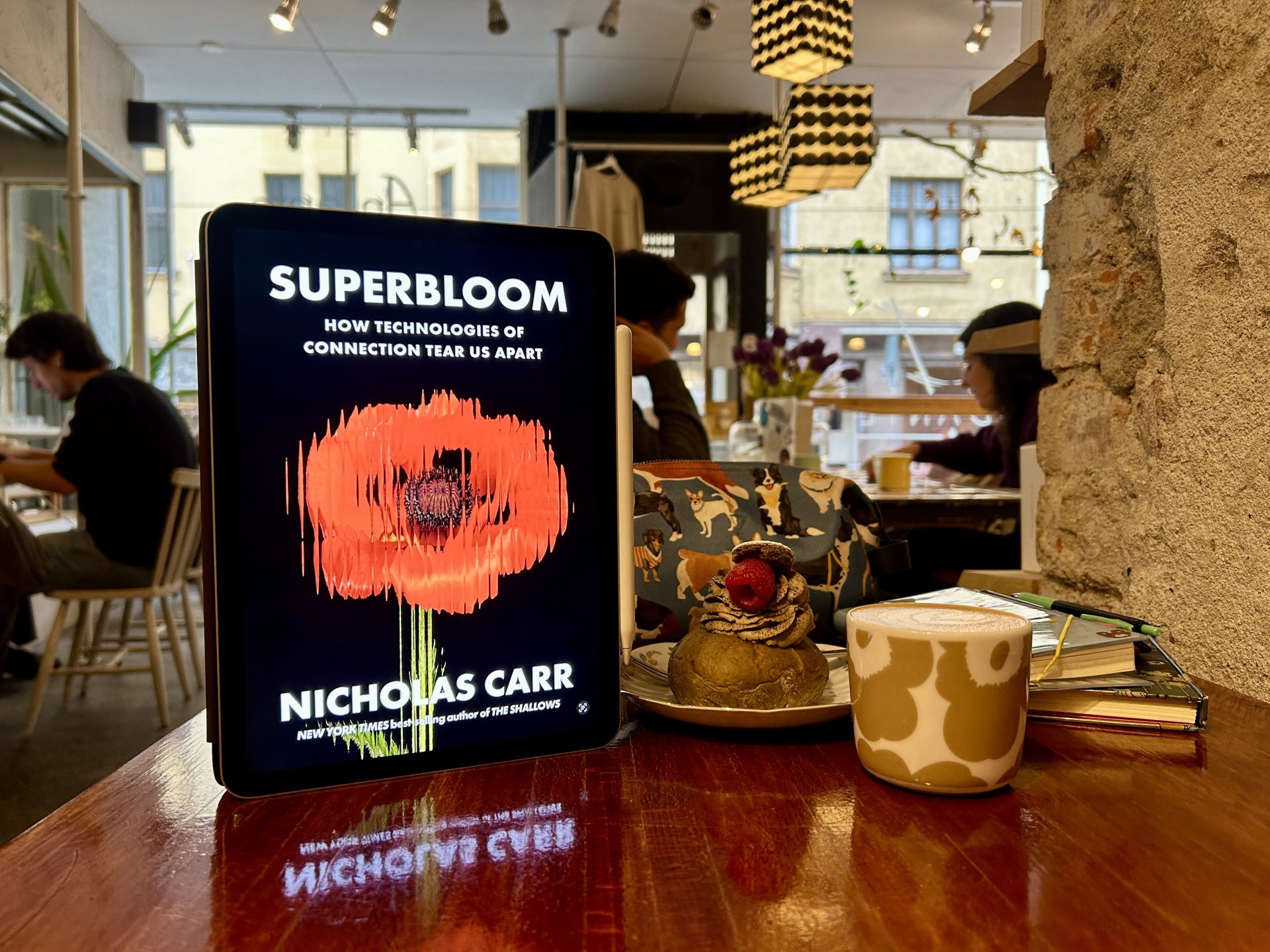 Superbloom eBook with a cup of coffee on a table