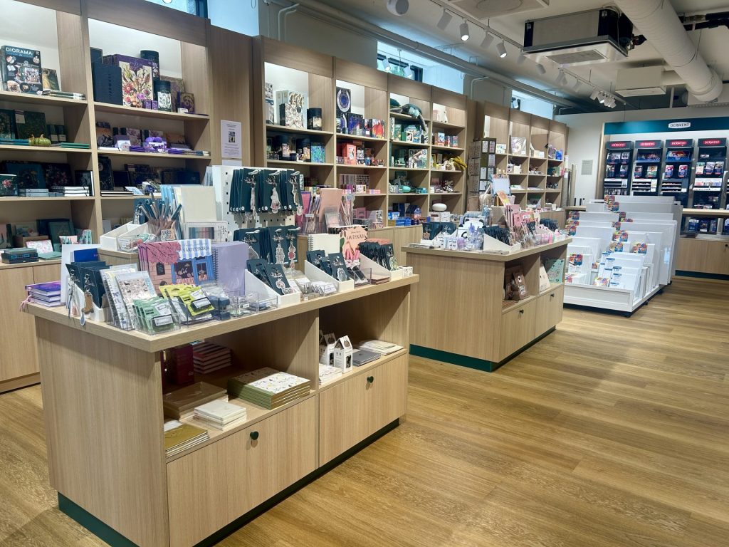 Stationery in multiple shleves in a stationery shop