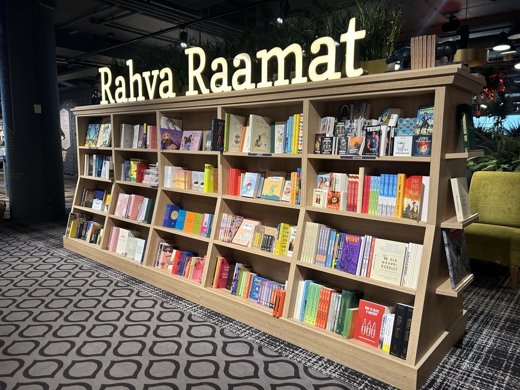 A bookshelf with 'Rahva Raamat' written on top of it.