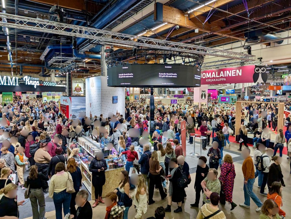 A crowd of people in a book fair